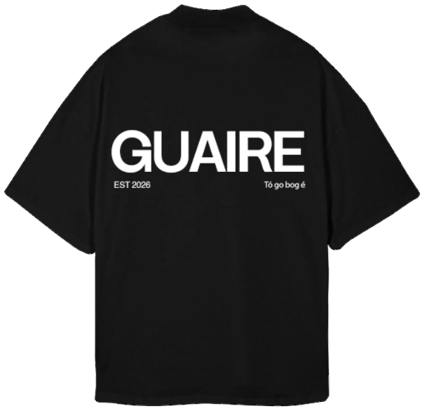 Back of a black oversized tee: GUAIRE in large white letters, with EST 2026 and Tóg go bog é set small underneath.