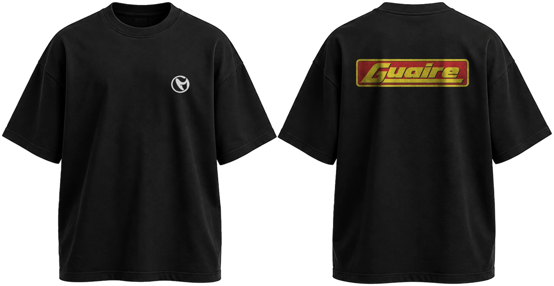 Black oversized tee, front and back: a white G roundel on the chest and the red and yellow Guaire sign across the back.